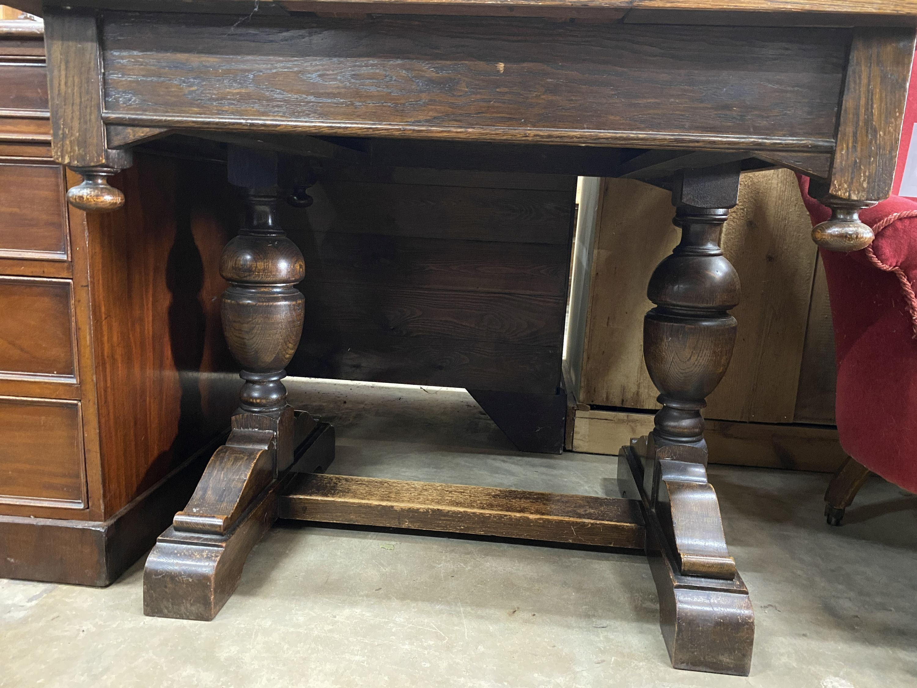 A 1930's oak draw leaf dining table, length 92cm, width 84cm, height 76cm